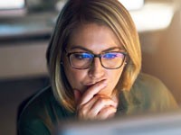 Woman looking at computer